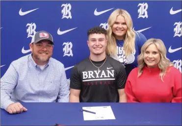  ?? Scott Herpst ?? Jeremy, Jamie and Maileigh Parker celebrate with Mason Parker as the Ringgold senior will be playing baseball at Bryan College after high school.