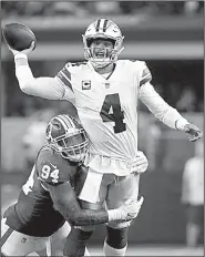  ?? AP/ROGER STEINMAN ?? and the Dallas Cowboys are in first place in the NFC East with five games remaining in the regular season. The Cowboys face the Philadelph­ia Eagles on Sunday at AT&amp;T Stadium in Arlington, Texas.
