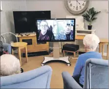  ?? ?? Youth workers Lesley Renton and Phil Edwards used Zoom to host the quiz between the youngsters and the care home residents.