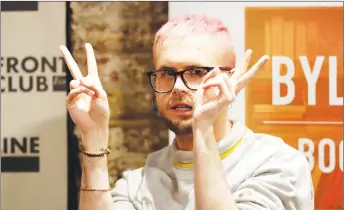  ?? AP PHOTO ?? Christophe­r Wylie, who once worked for the U.K.-based political consulting firm Cambridge Analytica, gives a talk at the Frontline Club in London.