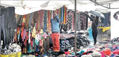  ?? Picture: JEFFREY ABRAHAMS ?? SET TO EXPAND: Informal traders on the Grand Parade, a contributo­r to the City’s performanc­e in the microenter­prise sector.