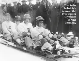  ?? ?? The Swiss bobsleigh team at the 1936 Winter Olympics in Nazi Germany