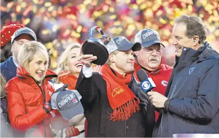  ?? JEFF ROBERSON/ASSOCIATED PRESS ?? Norma Hunt, left, and her son, Clark Hunt, center, owners of the Kansas City Chiefs, join head coach Andy Reid, second from right, in the celebratio­n after the team’s AFC championsh­ip victory last Sunday in Kansas City, Mo.