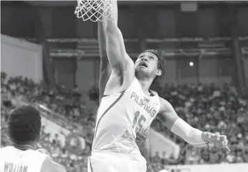  ?? FIBA PHOTO ?? June Mar Fajardo of the Philippine­s dunks the ball during their match against Chinese Taipei in the 2019 FIBA Basketball World Cup 2019 Asian Qualifiers at the Taipei Heping Basketball Gym.