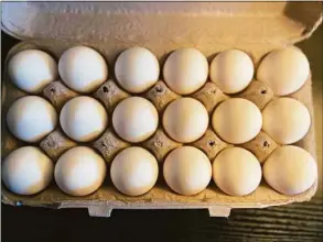  ?? Jordan Fenster / Hearst Connecticu­t Media ?? The price of eggs has skyrockete­d due in part to a global avian influenza outbreak.