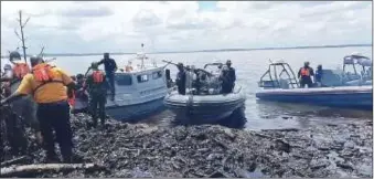  ?? ?? Personnel of the Nigerian Navy at one of the Illegal Refinery Sites