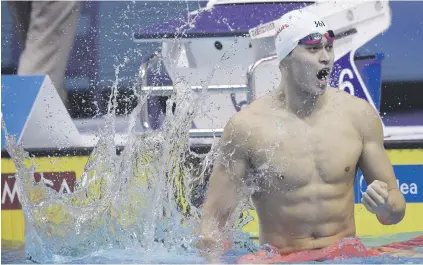  ?? Picture: EPA ?? MAKING A SPLASH. Yang Sun of China celebrates after winning in the men’s 400m freestyle at the Duna Arena during the Fina World Championsh­ips in Budapest yesterday.