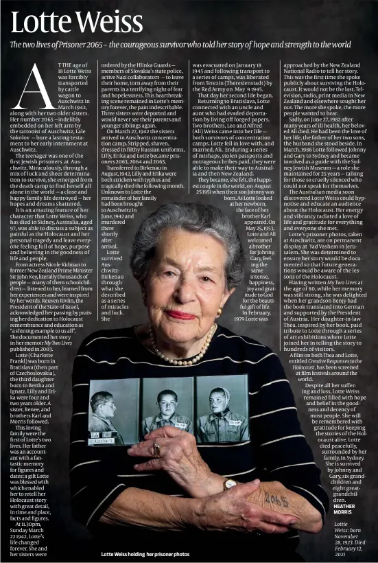  ??  ?? Lotte Weiss holding her prisoner photos