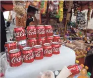  ?? REBECCA BLACKWELL/AP ?? Small merchants depend on soda for 25% of their sales, according to a trade alliance in Mexico.