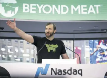  ?? (Photo: AFP) ?? Beyond Meat CEO Ethan Brown speaks before ringing the opening bell at Nasdaq Marketsite in New York City on Thursday.