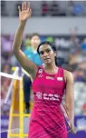  ?? — AFP ?? P.V. Sindhu celebrates after her victory against Japan’s Nozomi Okuhara in the women’s singles final to clinch the Korea Open Badminton Superserie­s in Seoul on Sunday.