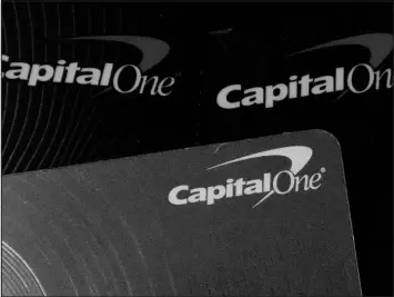  ?? NAM Y. HUH / ASSOCIATED PRESS FILE ?? Capital One Financial is buying Discover Financial Services for $35 billion in a deal that would bring together two of the nation’s biggest lenders and credit card issuers.