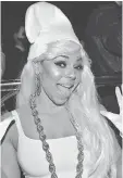  ?? MIKE COPPOLA/GETTY IMAGES ?? Ashanti was Smurfette at Heidi Klum’s 16th annual Halloween Party.