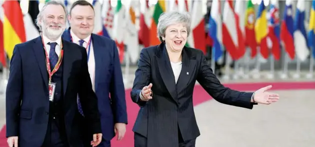  ?? Reuters ?? Theresa May arrives at a European Union leaders summit in Brussels, Belgium, on Thursday. BRUSSELS: