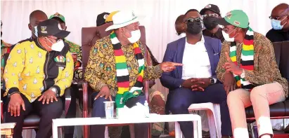  ?? — Picture: Believe Nyakudjara ?? President Mnangagwa converses with Cde Kembo Mohadi (right) while Vice President Constantin­o Chiwenga looks on at Chidodo Primary School in Uzumba yesterday before he addressed supporters.
ZANU PF