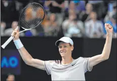  ?? Alessandra Tarantino The Associated Press ?? Jannik Sinner of Italy celebrates after handing Novak Djokovic of Serbia his first loss in an Australian Open semifinal with a four-set victory Friday.