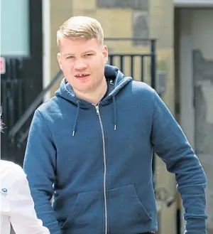  ??  ?? LOCKED UP: Shaun McLeod, left, and Liam Macdonald are taken from Perth Sheriff Court after being jailed for a vicious asault on a total stranger and scarring him for life