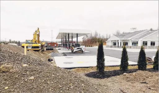  ?? Photos by Paul Buckowski / Times Union ?? A new Stewart’s store being built along Columbia Turnpike on Tuesday in Schodack. It is one of 17 new or rebuilt shops in 2020.