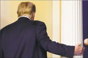  ?? Yuri Gripas / TNS ?? President Donald Trump departs after a news conference on Thursday at the White House in Washington.