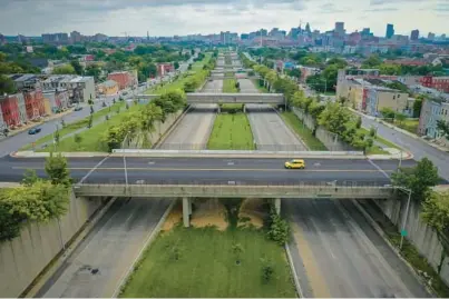  ?? JERRY JACKSON/BALTIMORE SUN ?? Many Black families were displaced in the 1970s so that a sunken, 1.4-mile section of U.S. 40, often called the “Highway to Nowhere,” could be built through the middle of West Baltimore.