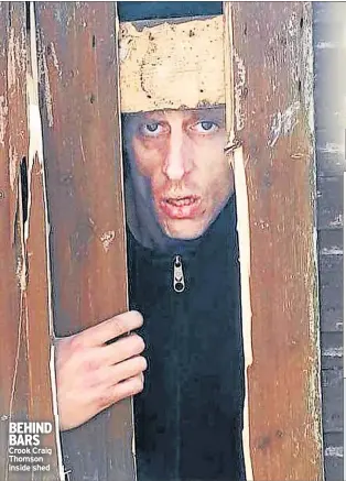  ??  ?? BEHIND BARS Crook Craig Thomson inside shed