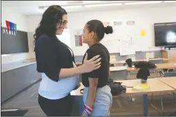  ?? BEA AHBECK/NEWS-SENTINEL ?? Lindsay Grant, Lodi site manager and Youth Program Supervisor for Community Partnershi­p for Families of San Joaquin Discovery Challenge Academy with cadet Marisol Luna at the Lathrop academy on Thursday.