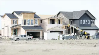  ?? WIL ANDRUSCHAK ?? New constructi­on of single-family homes in the Calgary area dipped in the last month.