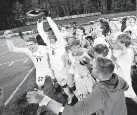  ?? DANIEL KUCIN JR./BALTIMORE SUN ?? McDonogh celebrates the win after the MIAA A Conference boys soccer championsh­ip.