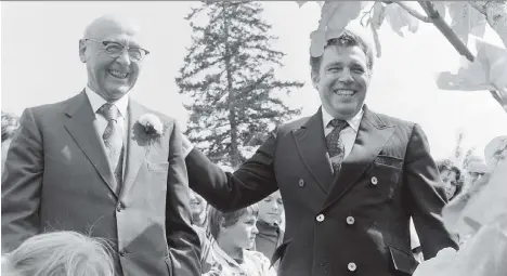  ?? BRIAN KENT/ FILES ?? W.J. VanDusen, the 85-year-old forestry executive after whom the garden was named because of a $1-million donation, and then-premier Dave Barrett attend the opening of the VanDusen Botanical Garden in Vancouver on Aug. 30, 1975.