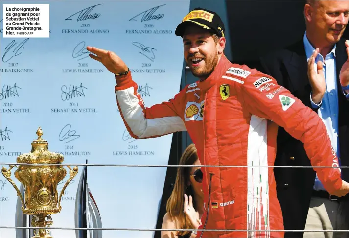  ?? PHOTO AFP ?? La chorégraph­ie du gagnant pour Sebastian Vettel au Grand Prix de Grande-bretagne, hier.