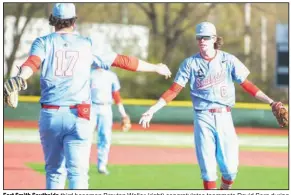  ?? (NWA Democrat-Gazette/Hank Layton) ?? Fort Smith Southside third baseman Braxton Waller (right) congratula­tes teammate David Sorg during the Mavericks’ game against Fort Smith Northside on April 7. Waller has been a leader on and off the field for the Mavericks, who have qualified for the Class 6A state baseball tournament this week.