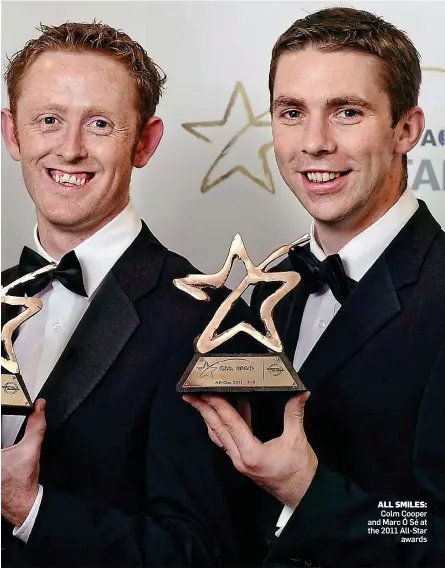  ??  ?? ALL SMILES: Colm Cooper and Marc Ó Sé at the 2011 All-Star awards