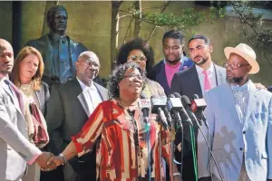  ?? LEROY BURNELL/THE POST AND COURIER ?? Judy Scott, widow of Walter Scott, who was killed by a former police officer in 2015, speaks at a plea hearing for the officer in Charleston, S.C., on May 2, 2017. The case, in which Scott was shot running from a traffic stop, was one of several that...