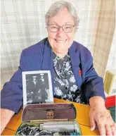  ?? ?? Frances Brown is pictured with an image of her late husband and the ophthalmos­cope.