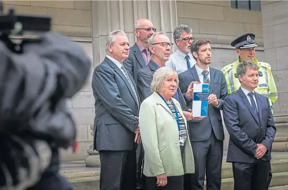  ?? Picture: Mhairi Edwards. ?? Dundee Drugs Commission deliver their report on the steps of the Caird Hall.