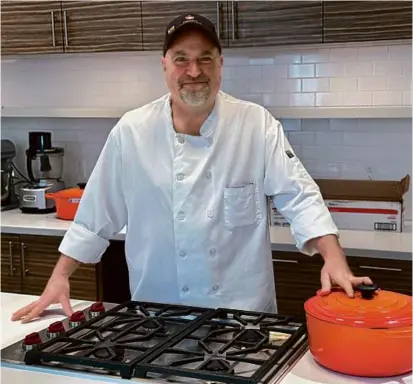  ?? ?? Roslindale’s Eric Spitz is the culinary instructor at Community Servings’ Teaching Kitchen.