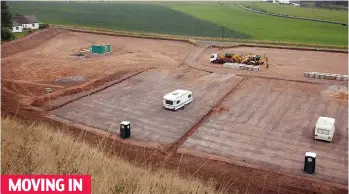  ??  ?? MOVING IN The first caravans appeared after the field had been cleared by bulldozers