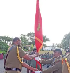  ?? Photo: Ronald Kumar ?? Republic of Fiji Military Forces Land Force Commander Colonel Manoa Gadai, hands over the colours to new 3FIR Commanding Officer Lieutenant-Colonel Aseri Rokoura at Queen Elizabeth Barracks on June 26, 2019.