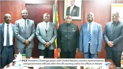  ?? ?? VICE President Chiwenga poses with United Nations country representa­tives and government officials after the UN courtesy call to his offices in Harare