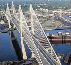  ?? COURTESY ?? A Georgia Ports Authority feasibilit­y study has called for replacing the Talmadge Bridge over the Savannah River with a higher bridge or a tunnel to accomodate larger container ships just now entering service.