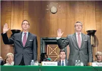  ?? ANDREW HARRER BLOOMBERG ?? Trump-appointed officials such as Joseph Otting, left, and Randal Quarles have said they want to adopt a less-draconian tone than their Obama-appointed predecesso­rs.