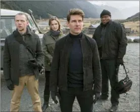  ?? DAVID JAMES — PARAMOUNT PICTURES AND SKYDANCE VIA AP ?? This image released by Paramount Pictures shows, from left, Simon Pegg, Rebecca Ferguson, Tom Cruise and Ving Rhames in a scene from “Mission: Impossible - Fallout.”