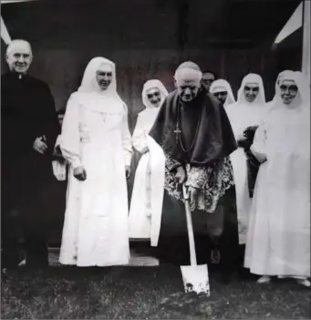  ??  ?? Bishop Denis Moynihan turning the Sod at St Mary of the Angels, Beaufort.