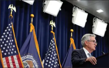  ?? Alex Brandon The Associated Press ?? Federal Reserve Board Chair Jerome Powell speaks during a news conference Wednesday at the Federal Reserve. The Fed raised its benchmark interest rate again.