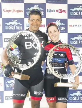  ?? Picture: Gallo Images ?? CHAMPIONS. Elite winners Nolan Hoffman and Kimberley le Court de Billot with their trophies after the Cape Town Cycle Tour at the Greenpoint Stadium yesterday.