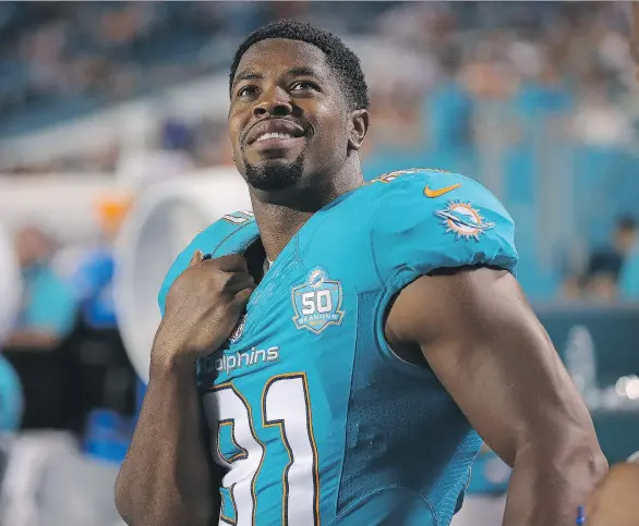  ?? GETTY IMAGES FILES ?? NFL star Cameron Wake, keynote speaker at the Orange Helmet Awards, has been described as ‘an example of what you can accomplish when you put your mind to it.’