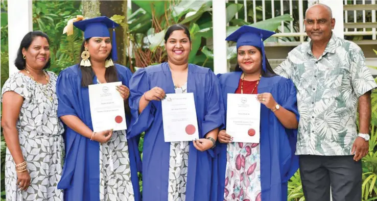  ??  ?? The Raj family (from left) Nalini (mother), Natasha, Shivanjani, Nishita and Ham (father).