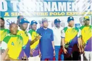 ?? ?? The IGP Police polo team players and officials pose with their prizes during the closing ceremony of the 2023 Abuja Carnival Polo Tournament over the weekend.