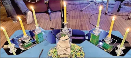  ?? David Crowder ?? Seven candles — representi­ng truth, healing, understand­ing, hope, thankfulne­ss, faith and steadfast love — were lit during Tuesday’s ceremony.