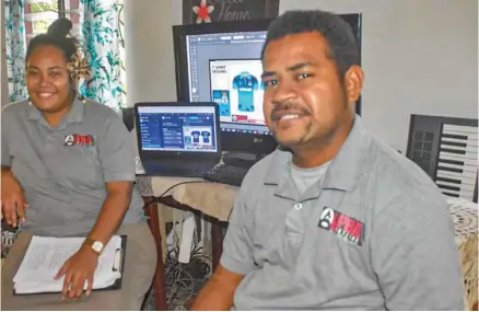  ??  ?? Talei Nausaroa and Ilai Lomaloma dealing with customers online business platform for Alpha Designs in Labasa.
